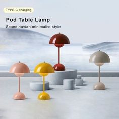 the table lamp is designed to look like it's in different colors and shapes