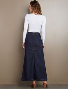 Details of old, made new. Beautiful waist/button detail, with pieced Premium denim construction, the Pieced Denim Maxi Skirt from Wash Lab is a must-own classic. The cover model is 5'9" wearing a size 26 Fabric: 95% Cotton 4% Polyester 1% Spandex Length: 39.25" from waist Dark Wash Denim Skirt With Pockets From Recycled Material, Dark Wash Recycled Denim Skirt With Pockets, Dark Wash Denim Skirt With Pockets In Recycled Denim, Fitted Medium Wash Recycled Denim Skirt, Fitted Recycled Denim Skirt With Pockets, Casual Fitted Denim Skirt In Recycled Material, Casual Fitted Denim Skirt In Recycled Denim, Fitted Casual Denim Skirt From Recycled Material, Casual Fitted Recycled Denim Skirt