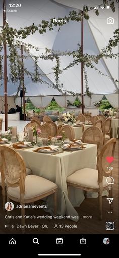 an outdoor tent with tables and chairs set up for a wedding reception in the middle of it