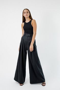 Women wide leg palazzo pants with back vents in gray color. They fit perfectly different body shapes and heights and visualize our unusual vision on basic pants. With this model you can create an incredibly stylish bridal look or comfy everyday city look. They are perfect with almost everything, cropped t-shirt to the blouse, cardigans, flat shoes, sneakers or heels you'll find them so easy to wear. Details: * High waist * Front pleats * Two side pockets   * Faux back pockets * Zip and hook-and- Modern Full Length Wide Leg Pants For Evening, Elegant Wide-leg Culottes For Party, Elegant Wide-leg Party Culottes, Elegant Party Wide-leg Culottes, Chic Full-length Wedding Bottoms, Chic Full Length Wedding Bottoms, Elegant Wide-leg Bottoms For Wedding, Elegant Wide Leg Party Culottes, Elegant Flared Bottoms For Wedding