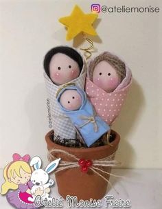 two dolls are in a potted plant with a star on the wall behind them