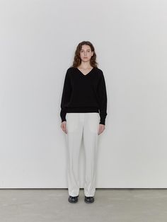 This is a minimal and modern pants by dankedir that is made out of high quality and sturdy material. With distinctive mood of the design and comfortable wear, you can style it for your clean daily outfit.- Back elastic waistband for comfortable wear- Classic and simple semi wide silhouette- Trendy and feminine mood Modern White Bottoms For Business Casual, Modern Pants With Elastic Waistband For Fall, Modern Pants With Minimal Stretch And Straight Hem, Modern Relaxed Fit Fall Pants, Modern Bottoms With Minimal Stretch For Fall, Modern Straight Pants For Everyday, Modern Pants For Everyday Fall Wear, Modern Bottoms With Elastic Waistband, Modern Pants With Relaxed Fit And Straight Hem