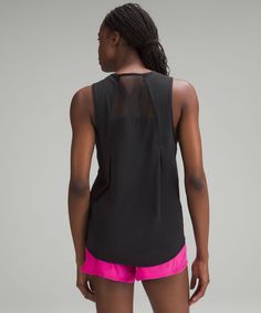 Sprints anyone This lightweight tank has mesh fabric panels for breathability in sweaty situations. Designed for Running. An easy fit that floats away from your body:Sits below the waistband for moderate, everyday coverage. Reflective details help keep you on the radar. Lululemon Summer Versatile Activewear, Black Lululemon Tops, Jumper Short, Back Women, Lululemon Women, Fabric Panels, Sleeveless Tank Top, Sleeveless Tank, Mesh Fabric