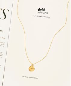 This coin necklace featuring St. Michael is a beautiful layering piece that will make you look vacation-ready year round. - Solid 14k gold coin - 14mm profile diameter - Delicate 16 inch gold chain Yellow Gold Round Charm Necklace, Tarnish Resistant, Gold-tone Brass Medallion Chain Necklace, Minimalist 14k Gold-filled Medallion Necklace, St Michael Necklace Men, Saint Michael Necklace, St Michael Necklace, Gold Charm Necklace, St Michael, Gold Coins