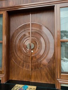 a wooden door with an intricate design on it