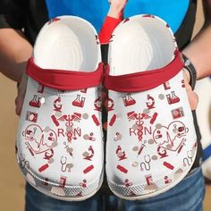 Nurse Red Symbols Pattern Crocs Crocband Clog Shoes For Men Women Lightweight construction with breathable mesh fabric provides a comfortable and flawless fit. Nurse Crocs, Nursing Crocs, Nurse Clogs, Crocband Clog, Crocs Clog, Medical Icon, Nurse Love, Crocs Crocband, Clog Shoes