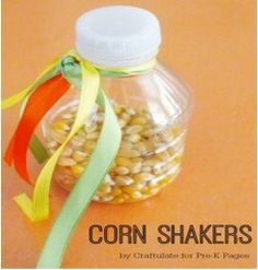 corn shakers in a glass jar with ribbon