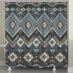 a shower curtain with an abstract design in blue, brown and tan colors on it