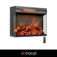 an electric fireplace with the words macy's above it