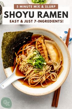 a bowl filled with noodles and meat next to chopsticks on top of a table