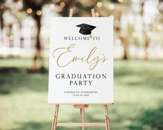 an easel with a sign that says welcome to enli's graduation party