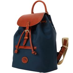 Durable and Chic  Crafted from durable-chic nylon that's virtually maintence-free, this backpack is ready for adventure wherever you go. Outdoor Coated Canvas Standard Backpack, Navy Nylon Backpack, Travel Backpack With Leather Trim And Nylon Material, Functional Coated Canvas Backpack, Coated Canvas Travel Backpack, Travel Backpack In Coated Canvas, Waterproof Softback Backpack For Travel, Travel Backpack With Leather Trim And Coated Canvas, Functional Coated Canvas Backpack For Travel