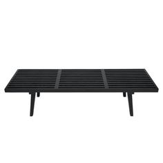 a black table with two legs and a slatted surface on the bottom, in front of a white background