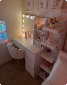 a bedroom with a vanity, mirror and lights on it's side table in front of a window