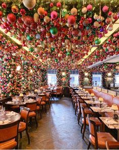 the dining room is decorated with christmas ornaments