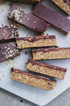 chocolate and granola bars on a white plate