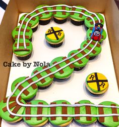 a train themed cupcake cake in a box