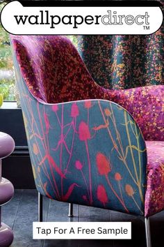 a colorful chair sitting in front of a window with the words wallpaper direct on it