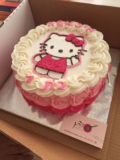 a hello kitty birthday cake in a box