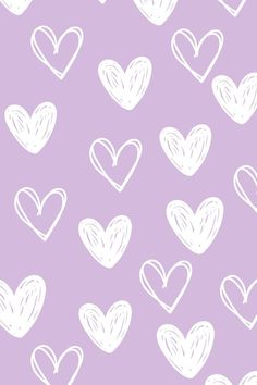 white hearts drawn on a purple background