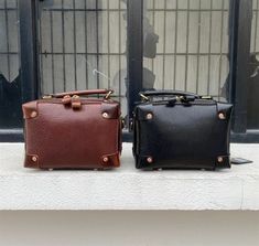 MATERIAL - Made of 100% high quality full-grain leather (Italy vegetable-tanned leather), solid color, feels cosy to touch,delicate, durable. The hardware parts are made of cast molding thick hardware, top metal hardware. The stitching is well-made, firm and smooth. YKK zipper.DIMENSIONS - 5.5L*3.5W*7.9H(inch) / 14L*9W*20H(cm)STRUCTURE - This handbag contains 1 main compartment, 1 inner slip pocket. Comfortably holds wallet, mobile phone, cosmetics, keys, charge, essentials and so on.FUNCTIONAL Brown Rectangular Satchel With Gunmetal Hardware, Brown Rectangular Shoulder Bag With Gunmetal Hardware, Brown Top Handle Satchel With Metal Hardware, Brown Top Handle Shoulder Bag With Gunmetal Hardware, Brown Satchel With Gunmetal Hardware For Daily Use, Brown Business Bags With Gunmetal Hardware, Brown Business Shoulder Bag With Gunmetal Hardware, Rectangular Office Satchel With Gunmetal Hardware, Brown Office Bag With Brass Hardware