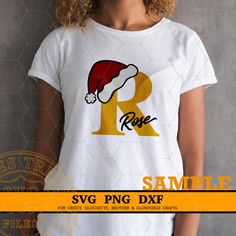 a woman wearing a t - shirt with the letter r in santa's hat