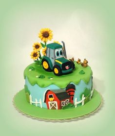 a birthday cake with a tractor and sunflowers on top