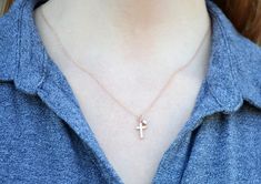 This beautiful and dainty cross necklace would be a perfect gift for a Baptism, First Communion, Confirmation or for a godchild or godparent. The gold plated charm is approximately .5 inches and is hung on a 16", 18" or 20" chain. Please add your chain length to the personalization section. If not added then we will include an 18" chain. The chains are dainty and very pretty - the perfect delicate necklace for everyday wear. The cross is beautiful alone or can be accentuated with a birthstone to Dainty Cross Necklace For Baptism, Cross Jewelry For Baptism And Mother's Day, Dainty Cross Necklace For First Communion, Baptism And Mother's Day Cross Pendant Jewelry, Mother's Day Baptism Cross Jewelry, Cross Jewelry For Confirmation And Mother's Day, Personalized Dainty Cross Necklace, Godchild Gift, Necklace For Everyday