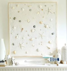 a white mantle with shells and seashells on it