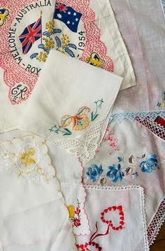 "Vintage Handkerchiefs Sold Individually The following pieces are available Christmas Hankie decorated with red flowers along the edges and inside fabric shows silhouettes of reindeer measures 14\" x 14\" Scalloped edge Hankie with gold trim and gold embroidered flowers in one corner 11\" x 10.5\" Yellow Hankie with brown band outline and one corner is embroidered a leaf 11\" x 10.5\" Hankie with embroidered red hearts and lace trim 13\" x 12.5\" Hankie embroidered with Best Wishes and red and p Red And White Gingham, Vintage Handkerchiefs, Blue Roses, Red Hearts, Pink Accents, My Valentine, Best Wishes, White Crochet, White Trim