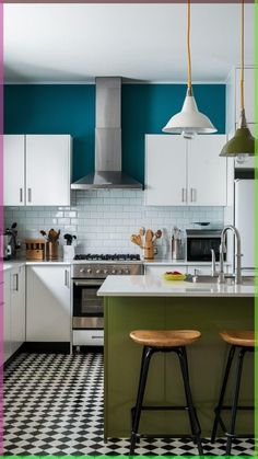 two stools sit in front of a kitchen island with white cabinets and black and white checkered flooring