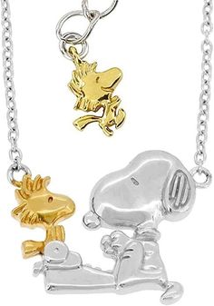 two necklaces with snoop and dog charms on each one, both in gold and silver