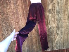 Vintage size 8 shimmer burgundy pants. Please check measurements to ensure fit. Condition - has a scuff at back of right knee- see last photo. Measurements taken across front laid flat 12.5" across front of waist -stretches to 17.5" 20" across front of hips 14" rise 30" inseam Burgundy Stretch Pants For Night Out, Stretch Burgundy Bottoms For Party, Stretch Burgundy Bottoms For Night Out, Stretch Burgundy Pants For Party, Burgundy Wide Leg Pants For Party, Burgundy Pants, Waist Stretches, Womens Pants, Favorite Outfit