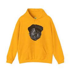 Embrace the legacy of two hip-hop icons with our Tupac and Notorious BIG Half Faces Hoodie! This Gildan 18500 hoodie features a striking design combining the faces of Tupac Shakur and Notorious BIG into one cohesive image. Perfect for keeping warm in style, this hoodie is a must-have for fans of 90s rap and music history. Key Features: Half faces of Tupac Shakur and Notorious BIG Gildan 18500 hoodie for comfort and warmth High-quality graphic print Ideal gift for hip-hop fans Unisex fit suitable 90s Letter Print Hoodie For Streetwear, 90s Style Letter Print Hoodie For Streetwear, 90s Style Hoodie Sweatshirt With Graphic Print, 90s Hooded Sweatshirt With Graphic Print, 90s Hooded Graphic Print Sweatshirt, 90s Style Graphic Print Hoodie Sweatshirt, 90s Streetwear Hoodie With Crew Neck, Pop Culture Fan Merchandise Hoodie For Winter, Pop Culture Hooded Sweatshirt Fan Merchandise