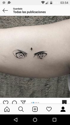 an eye tattoo is shown on the right arm and left arm, with two small eyes in