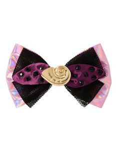 Complement your wicked under-the-sea look with this Ursula Hair Bow! This holographic hair bow features purple and black detailing and is centered with a goldtone seashell that any Disney fan will recognize from The Little Mermaid. If Ursula is your favorite of all the Disney villains, this accessory was made for you! Officially licensed Dimensions: 3" H x 5" W x 1.5" D Material: Acrylic, iron, polyester Care: Spot clean Imported Ursula Hair, Disney Hair Bows, Holographic Hair, Disney Hair, Spencers Gifts, Disney Costumes, Disney Fan, Halloween Accessories, Disney Villains