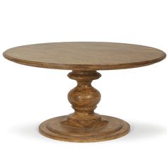 a round wooden table with two pedestals