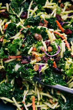 a salad with broccoli, carrots and other vegetables