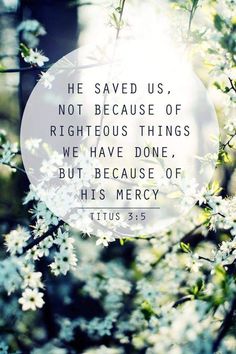 a white circle with the words, he saved us, not because of righteous things we have done, but because of his mercy