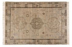 an antique rug with fringes on the edges and a design in grey, beige and black