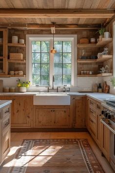 a kitchen with wooden cabinets and white counter tops, along with an area rug on the floor