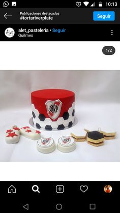 a red and white cake sitting on top of a table