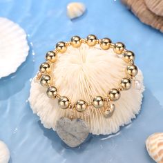 Embrace the natural beauty of summer with our unique Natural Stone Heart Bracelet with Pearl. This vintage-inspired charm will elevate your fashion and style, adding a special touch to any outfit. The 18k Gold on Brass also ensures the long-lasting color retention. The natural stones and glimmering pearl guarantee a shinning look that will make you stand out on any occasion. Don't miss out on this popular and timeless accessory! DETAILS Plating: 18k Gold Materials: 18k Gold on Brass, Natural Sto Bohemian Bracelets With Heart Charm For Valentine's Day, Gold Beaded Charm Bracelet For Beach, Summer Heart Shaped Jewelry With Heart Beads, Elegant Gold Beaded Bracelets For Summer, Summer Heart-shaped Gold Jewelry, Adjustable Gold Heart Bracelet Bohemian Style, Casual Jewelry With Heart Charm And Round Beads, Bohemian Charm Bracelet With Heart Beads As Gift, Adjustable Gold Bohemian Heart Bracelet