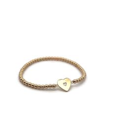 Discover elegance and charm with our LOVE HEART Gold Filled Beads Bracelet, a delightful addition to any jewelry collection. This stunning piece combines the timeless appeal of gold filled beads with a heart-shaped pendant crafted from gold plated sterling silver. Designed to be adjustable, it offers both style and comfort, making it perfect for everyday wear or special occasions. Handcrafted in our Miami workshop, each bracelet is made to order with meticulous attention to detail. We prioritize Heart-shaped Everyday Beaded Jewelry, Elegant Yellow Gold Bracelet With Heart Beads, Everyday Jewelry With Heart Charm And Round Beads, Dainty Heart Charm Bracelet With Round Beads, Dainty Jewelry With Heart Charm And Round Beads, Wedding Beaded Bracelets With Heart Charm, Gold Jubilee Bracelet Jewelry For Valentine's Day, Dainty Bracelet With Heart Charm And Round Beads, Heart-shaped Beaded Bracelets For Valentine's Wedding