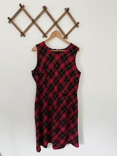 Vintage Banner New York red and black plaid midi sleeveless dress; zips down the back. it had strings for belt loops (they can easily be cut off if you don't want them).  Tag reads size 18 ✿ MEASUREMENTS ✿ laying flat width (pit to pit): 22" length: 39" 65% polyester, 35% rayon Made in USA »» Follow us on Instagram! @wildliliesvintage »» Please note our items are vintage and pre-loved, so they will most likely have some wear to them. However, any major noticeable flaws will be listed in the item's description. »» PLEASE READ MEASUREMENTS. For best fit, we recommend measuring a similar item in your closet for comparison. »» If you have any questions, please message me! Sleeveless Plaid Dress For Fall, Sleeveless Plaid Dress For Work, Vintage Banner, New York Red, New York Vintage, Red And Black Plaid, Pittsburgh Pa, Midi Dress Sleeveless, Black Plaid