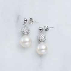 Beautiful Pearl And Pave Cz 1.48 Cttw On Silver Pierced-Drop Pearl With Cz Ball Accents. Silver Out 925 Mark. New With Manufacturers (Wholesale) Tags. Sterling Silver Pave Bridal Earrings For Anniversary, White Sterling Silver Bridal Earrings With Pave Setting, Sterling Silver Pave Bridal Earrings As Gift, Sterling Silver Bridal Earrings With Pave Setting, Silver Pave Setting Bridal Earrings, Anniversary Sterling Silver Pave Bridal Earrings, White Dangle Earrings With Pave Setting, Diamond White Sterling Silver Dangle Pearl Earrings, Sterling Silver Dangle Pearl Earrings In Diamond White