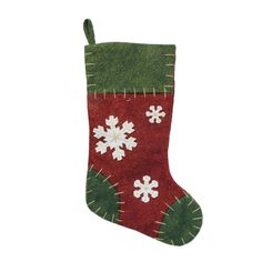 a red and green christmas stocking with white snowflakes on it's side