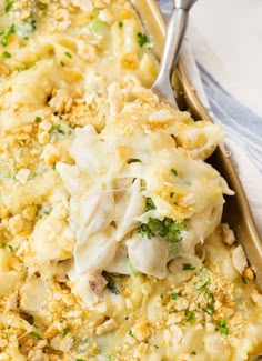 a casserole dish with broccoli and cheese