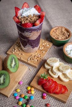 an assortment of fruits and cereals on wooden cutting boards