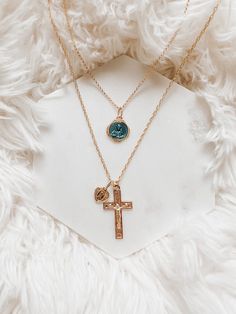 Sourced from France these lovely medals pair so well together! The floral Crucifix is 7/8” and the heart framed Miraculous medal is double sided. Both pendants are gold plated suspended from a 16” 14k gold filled rope chain. Blue Sacred Heart necklace sold separately.  Limited availability. Spiritual Cross Pendant Clavicle Chain, Spiritual Clavicle Chain With Cross Pendant, Spiritual Clavicle Chain Cross Jewelry, Adjustable Cross-shaped Jewelry With Charms, Spiritual Crucifix Necklace As Gift, Spiritual Crucifix Necklace For Gift, Spiritual Rose Gold Birthstone Jewelry, Rose Gold Crucifix Necklace As Gift, Spiritual Jewelry With Clavicle Chain And Round Pendant